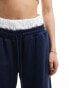 Фото #3 товара ASOS DESIGN oversized jogger with boxer waistband in navy