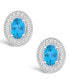 Blue Topaz (1-1/7 ct. t.w.) and Diamond (1/5 ct. t.w.) Halo Studs in Sterling Silver