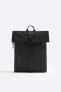 Rubberised backpack with flap