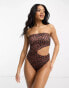 ASOS DESIGN bandeau cut out swimsuit in tortoise shell print