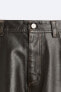 Washed leather effect trousers