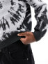 ASOS DESIGN relaxed knitted jumper in black with tie dye pattern