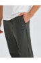 Фото #22 товара Брюки мужские Skechers M Micro Collection Regular Woven Pant хаки