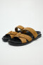 Split suede sandals with straps