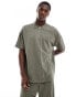 Фото #1 товара New Look 1/4 zip pique polo shirt co-ord in khaki