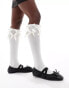 Reclaimed Vintage knee high socks with bows in white