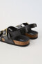 Buckled leather sandals