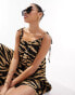 Фото #2 товара ASOS DESIGN tie strap detail trapeze maxi slip dress in animal print