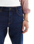 ASOS DESIGN tapered fit stretch jeans in dark wash blue VERWASCHENES DUNKELBLAU, W32 L32 - фото #3