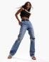 ASOS DESIGN mid rise straight jean in mid blue with knee rips