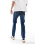 Фото #2 товара Levi's 515 slim taper jeans in mid blue