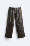 Washed leather effect trousers