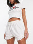 COLLUSION frill short in white