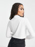 The North Face Nekku high neck cropped long sleeve top in white Exclusive at ASOS