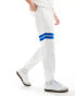 Lacoste logo joggers with contrast stripe in white