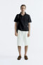 Knit polo shirt with opening