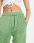 Фото #4 товара Urban Revivo checkerboard trousers in green