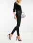 ASOS DESIGN coated skinny jean in black