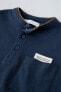 Piqué polo shirt with pocket