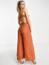 Фото #1 товара ASOS DESIGN linen tie back button side jumpsuit in terracotta