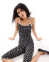 Фото #3 товара ASOS DESIGN spaghetti strap jumpsuit with contrast binding and split hem in mono spot print