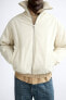 Jacket with ribbed collar