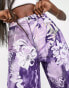 Weekday straight leg trousers in purple abstract flower