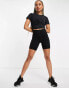 Фото #8 товара Nike Training One Luxe Dri-FIT wrap cropped top in black