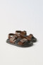Sandals with buckles