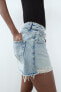 TRF CURVED HIGH-WAIST RIPPED DENIM SHORTS