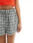 ASOS DESIGN Petite short with ruffle detail in mono gingham