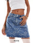 Фото #1 товара Vero Moda Petite denim a-line mini skirt in embroidered floral print