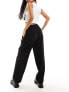 Фото #7 товара Miss Selfridge extended tab carrot leg trouser in black