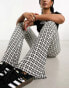 Noisy May flared trousers in black houndstooth