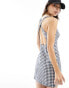 Фото #2 товара Tommy Jeans strappy mini dress in gingham print