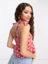 ASOS DESIGN Petite tie strap sun top with pephem in red based ditsy floral print