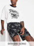 Фото #1 товара ASOS DESIGN pyjama set with t-shirt and shorts in black and white with burger print