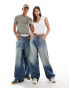 Фото #1 товара Weekday Unisex Astro loose fit wide leg jeans in streaky blue wash