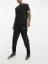 Фото #3 товара Костюм спортивный Hummel - брюки для джоггинга из хлопка в черном цвете с логотипом