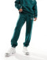 Фото #1 товара COLLUSION Logo joggers in green