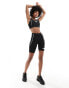 Фото #1 товара The North Face Training Hakuun contour seam high waist legging shorts in black