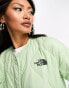 The North Face Ampato long quilted liner jacket in sage green Exclusive at ASOS