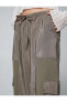 Фото #9 товара Брюки спортивные Koton Jogger с карманами на поясе, шнурком и деталями из блестящей ткани