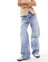 Stradivarius Petite wide leg dad jean with rips in medium wash blue