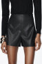 Leather effect high-waist bermuda shorts