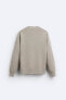 Sweater with mercerised finish