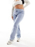 In The Style Plus denim cross waist jeans in blue