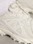 New Balance 610 trainers in off white