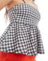 ASOS DESIGN textured peplum cami top in gingham