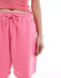 Фото #4 товара Weekday Unisex jersey shorts in bright pink exclusive at ASOS